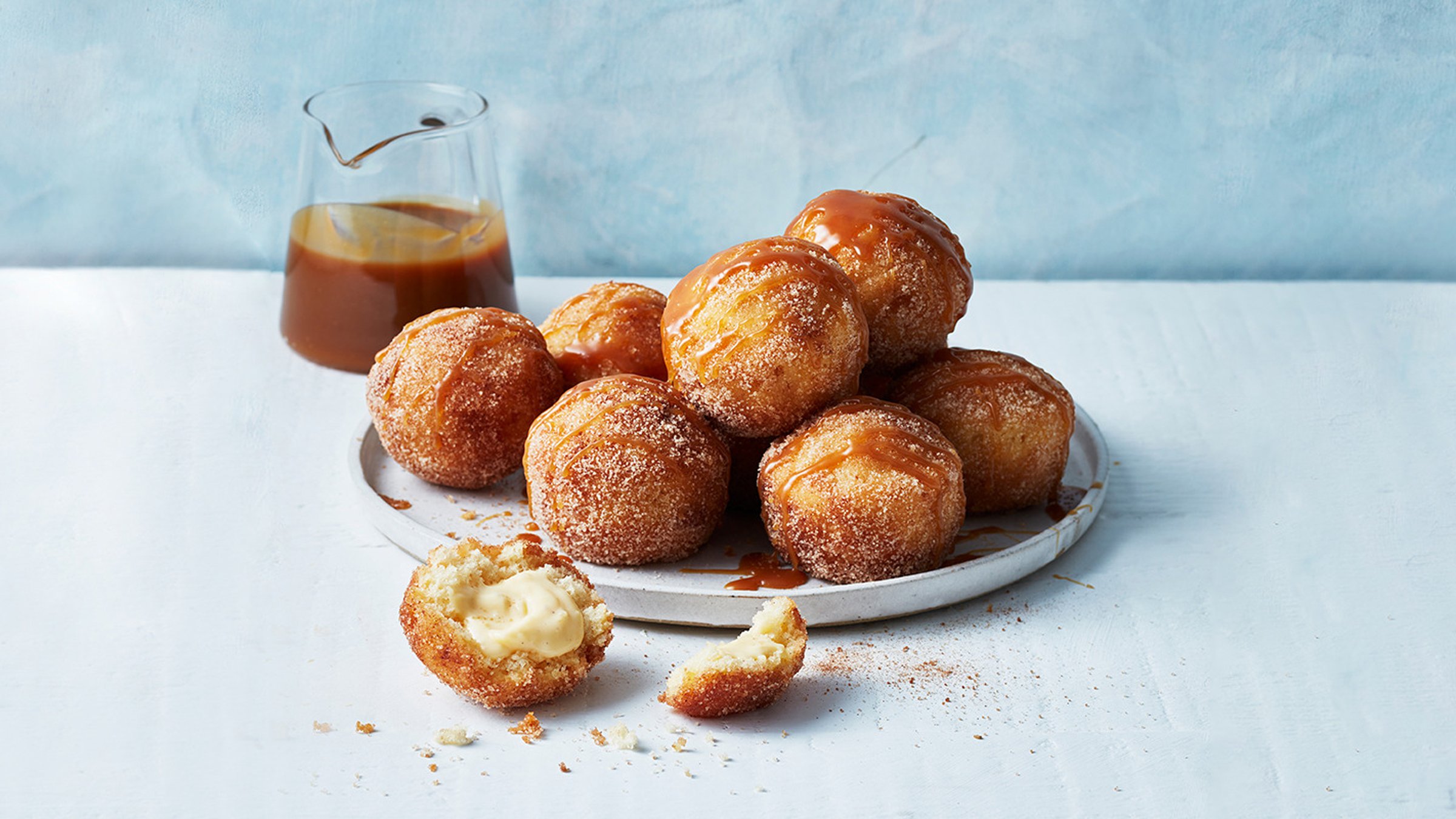 Custard Filled Donuts with Salted Maple Butterscotch White Wings